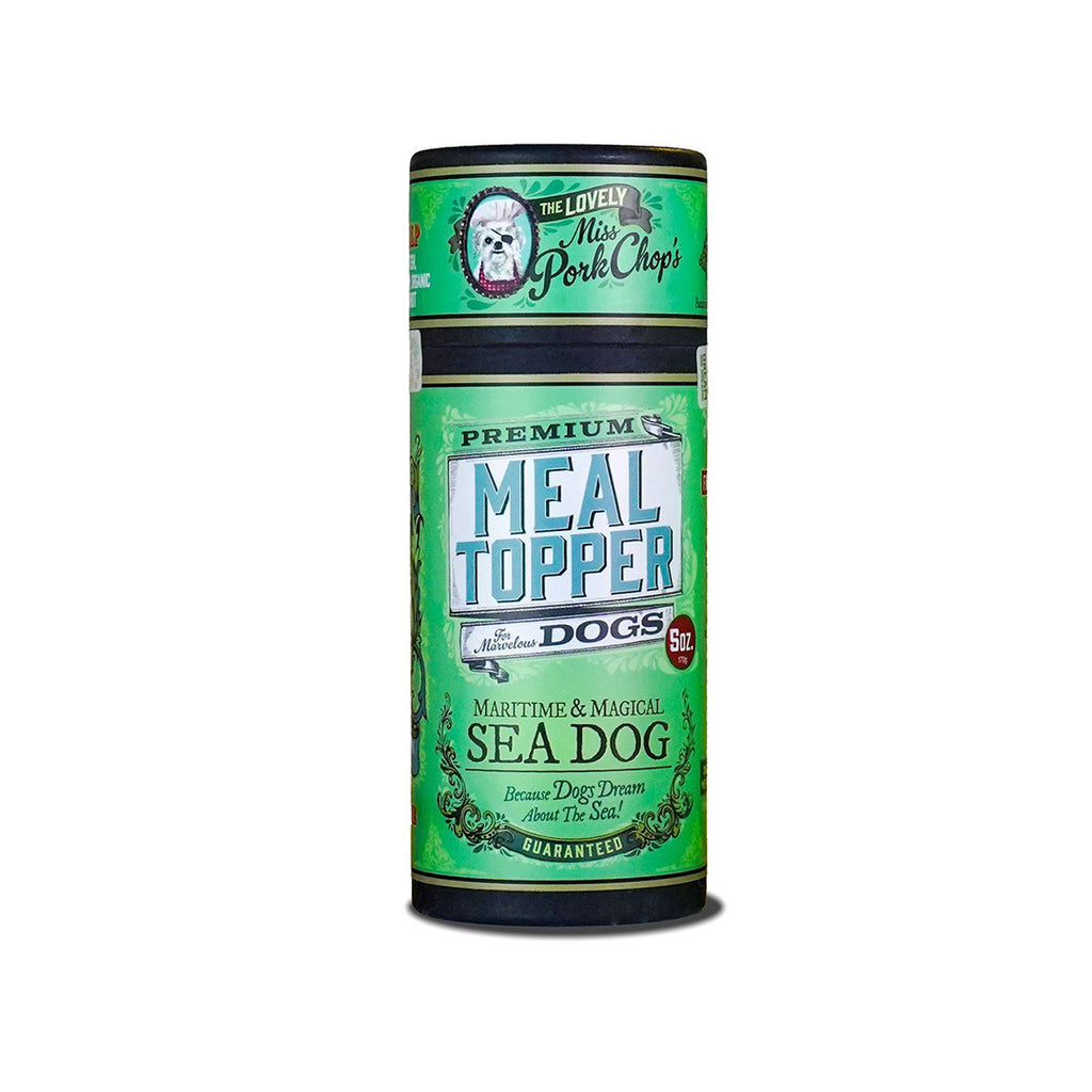 Green canister of Sea Dog Meal Topper for dogs on a white background